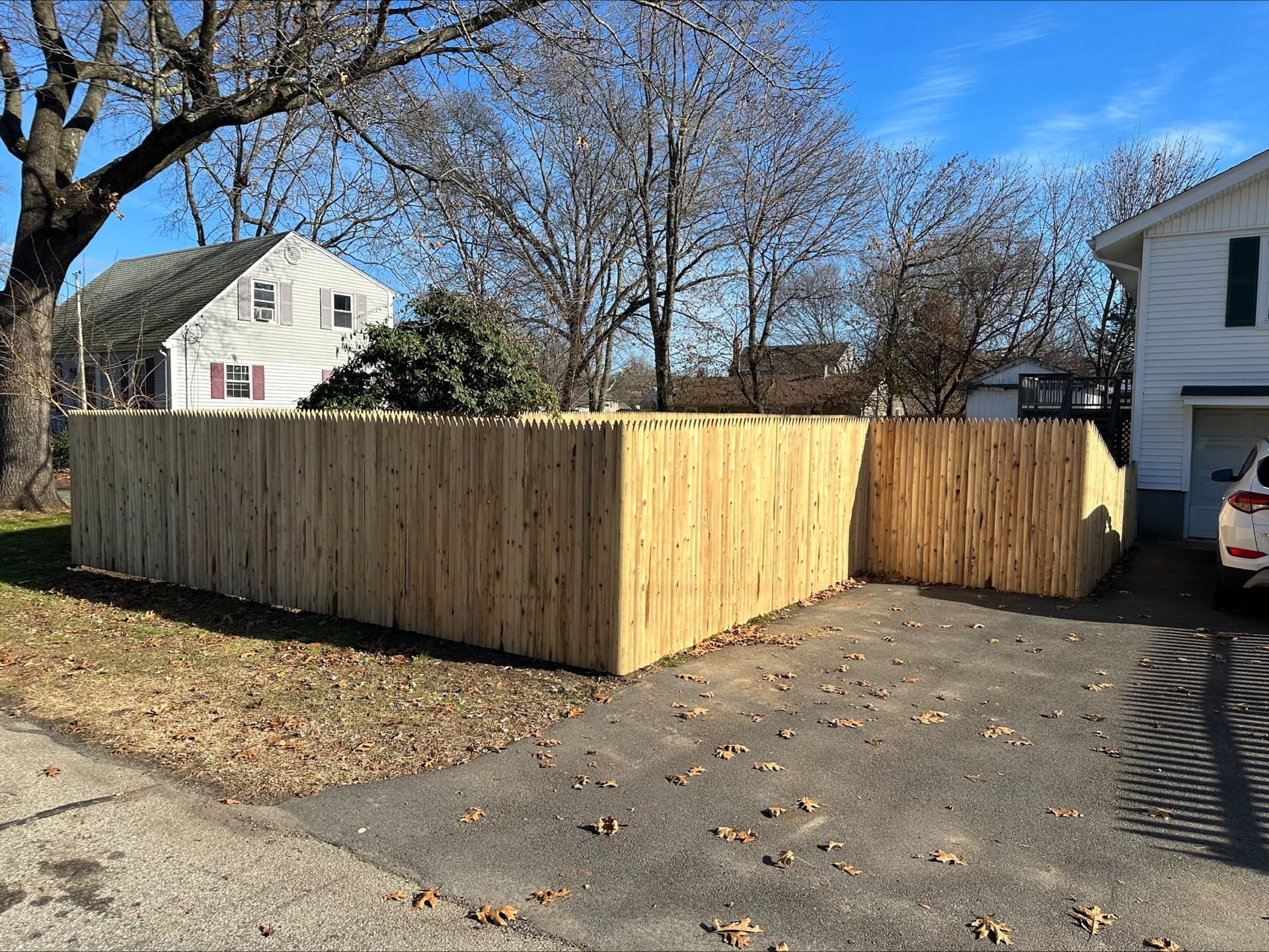 Completed privacy fence installation by professional contractor